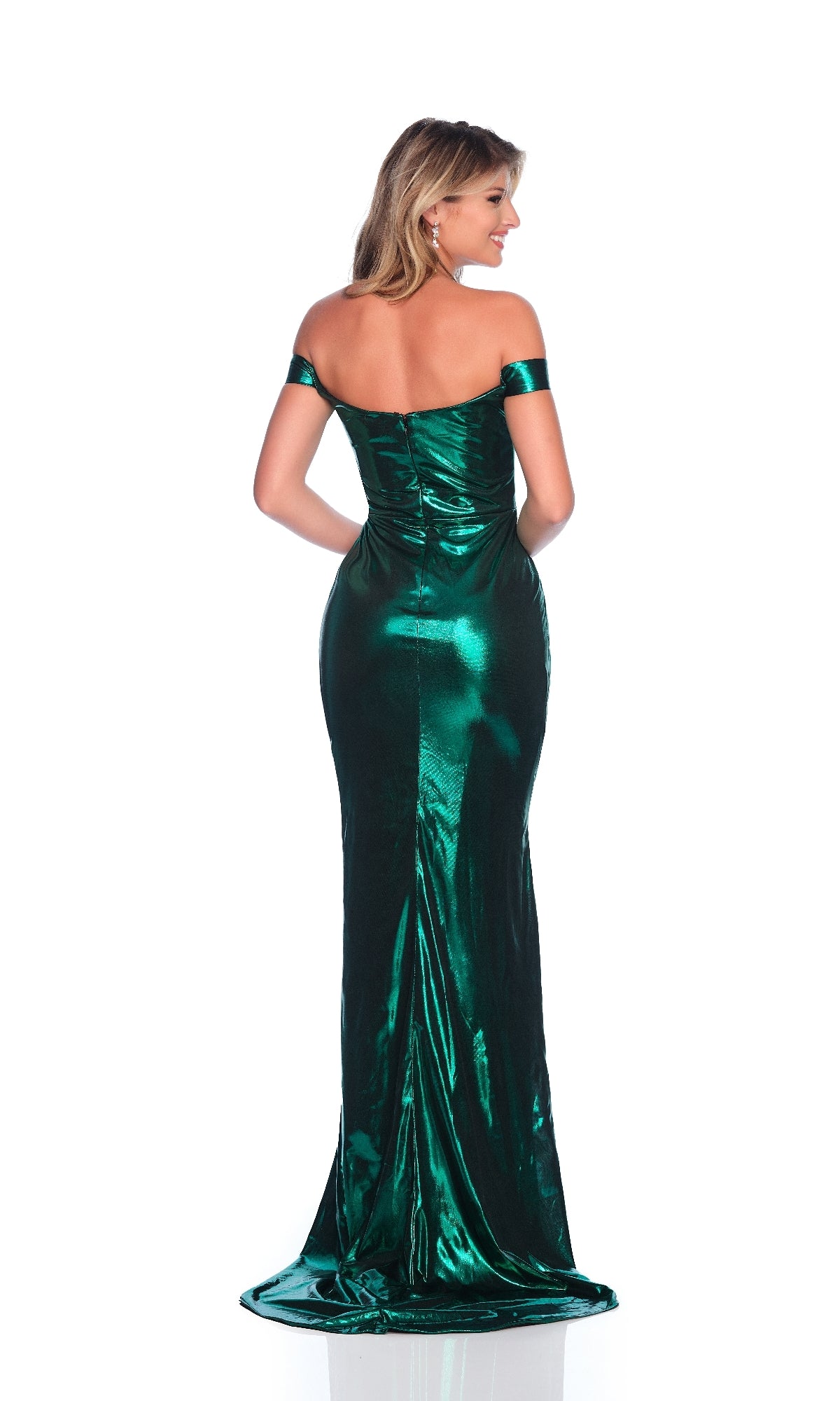 A woman stands with her back to the camera in the Dave & Johnny 12323 Metallic Green Prom Dress, an off-the-shoulder gown that drapes elegantly to the floor against a white background.
